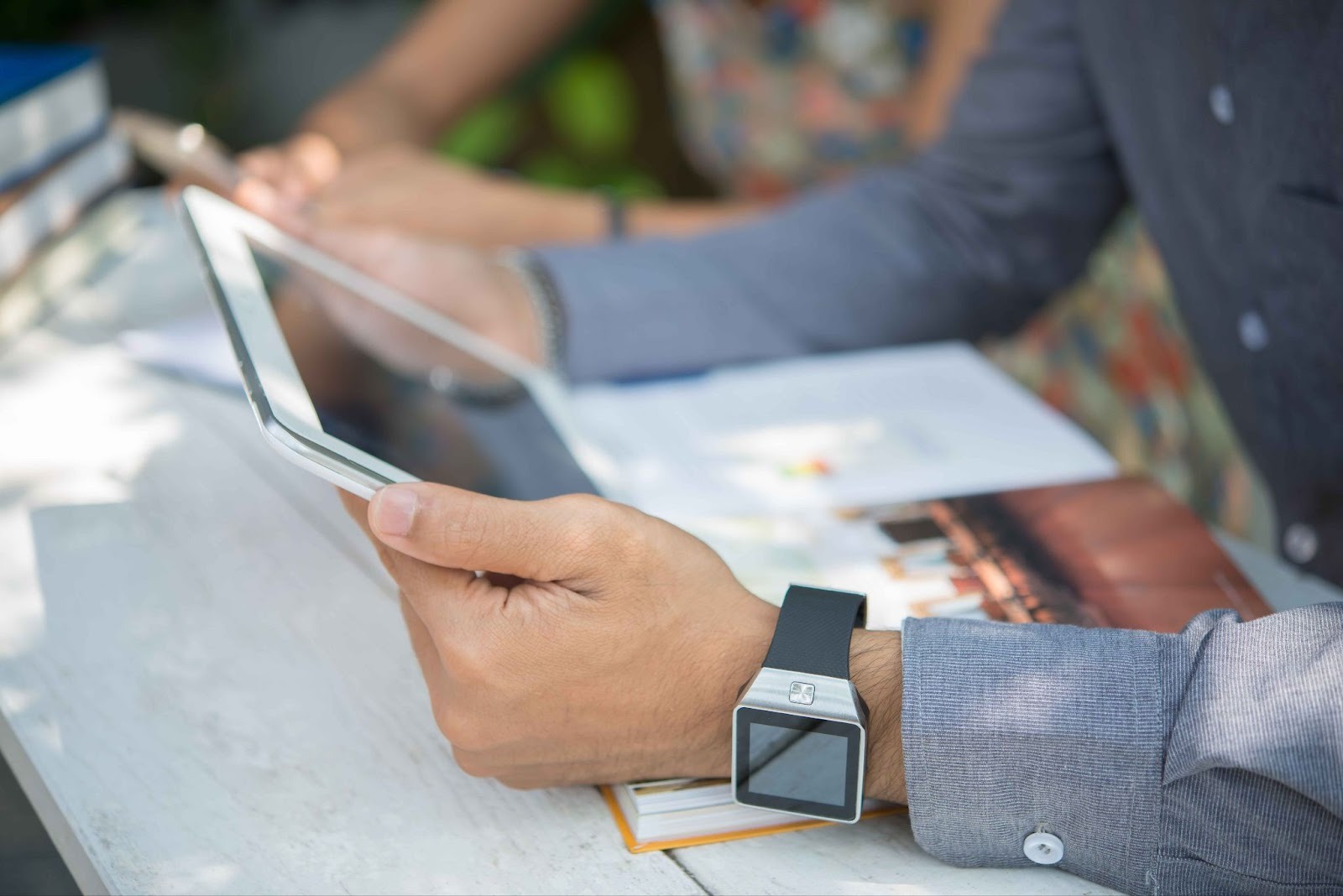 Employee using a tablet time clock