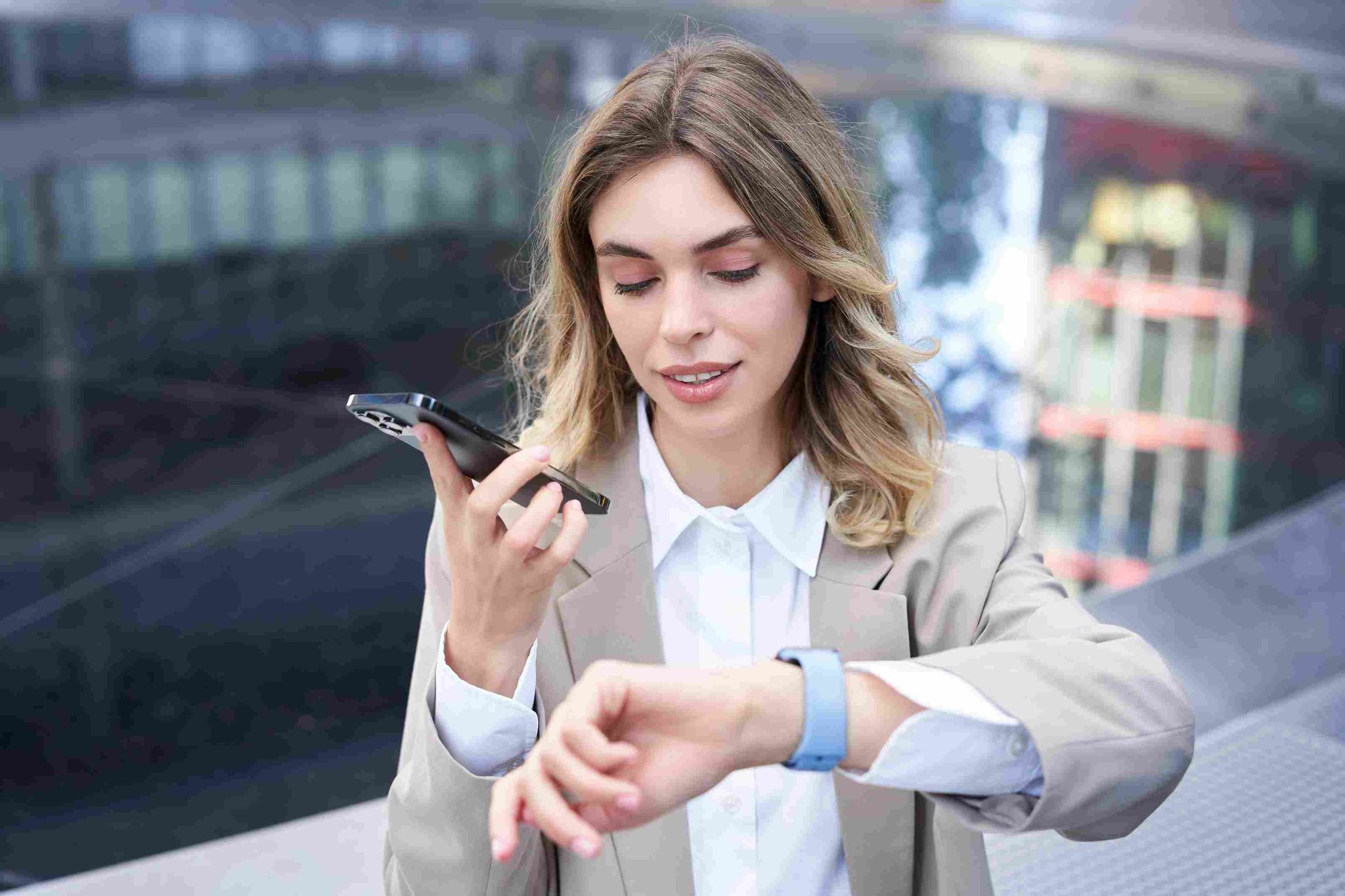 Woman looking at her smartwatch