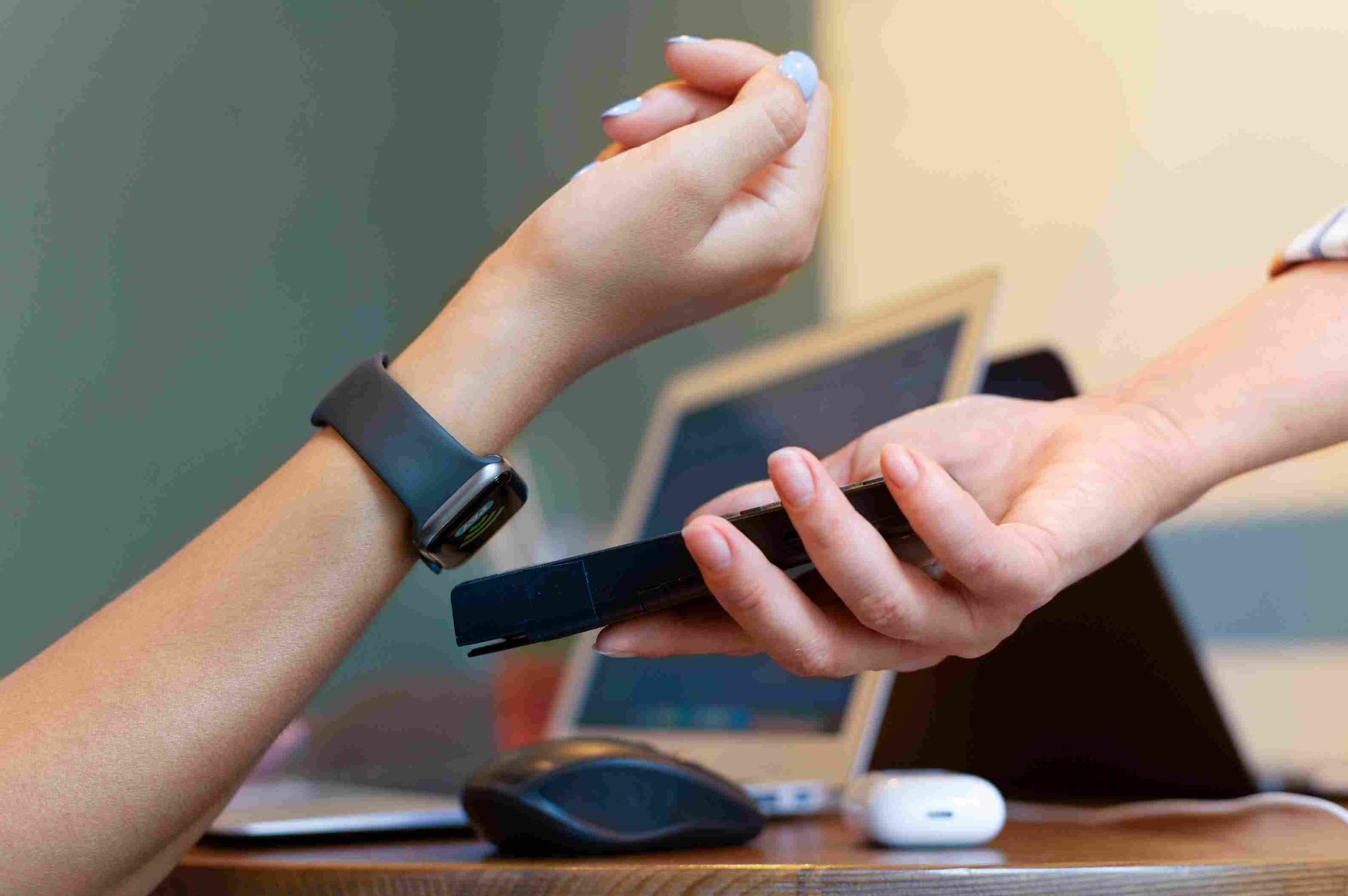 Employees using smart devices for time tracking