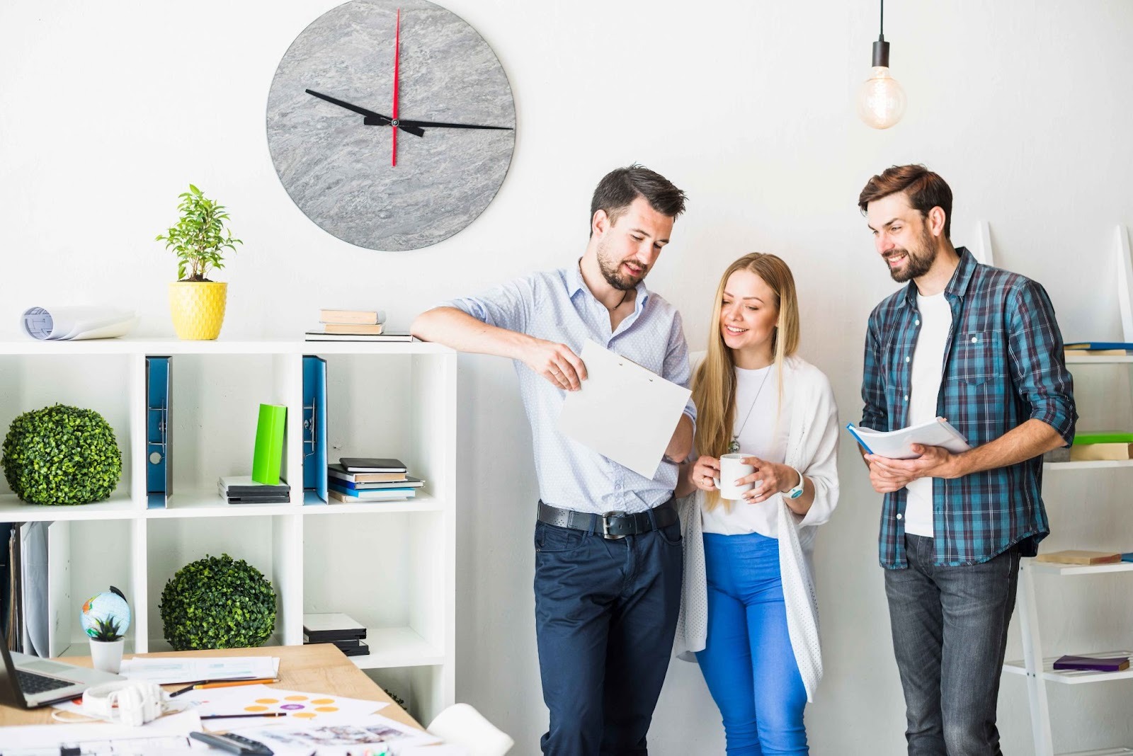 People looking at a clock