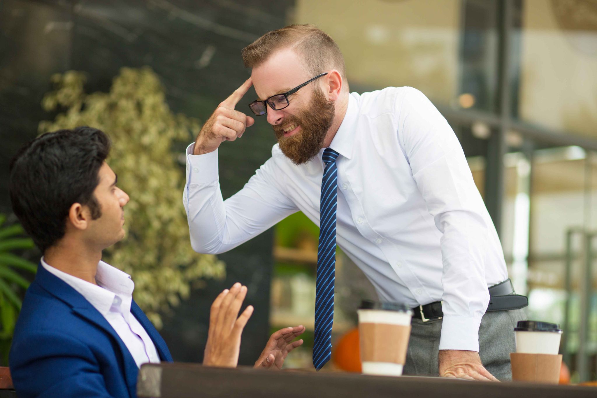 Manager confronting employee about buddy punching in the workplace