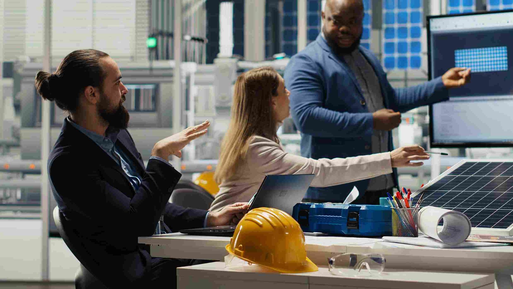 Construction management team reviewing performance data in an office