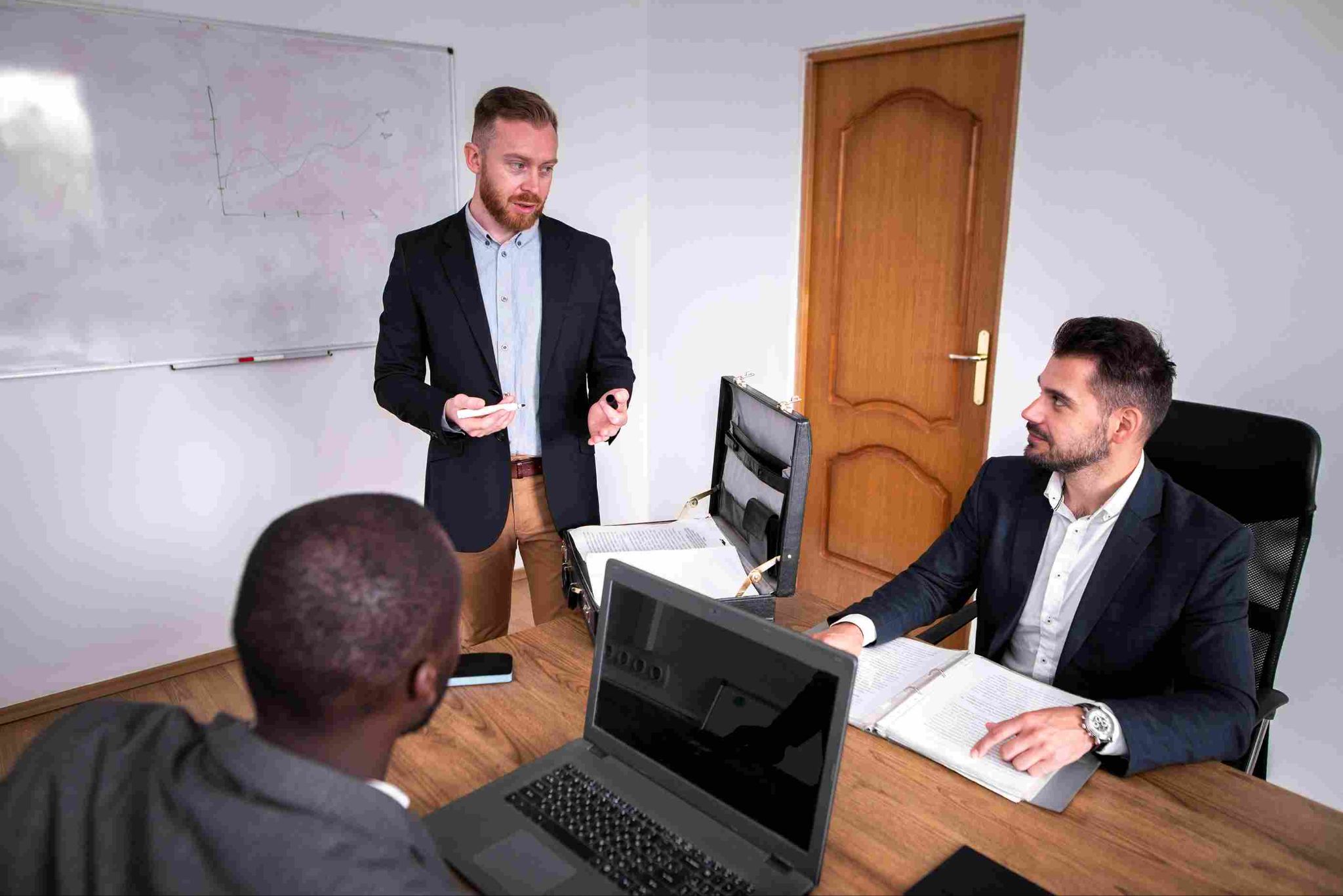 Manager discussing schedule with employee