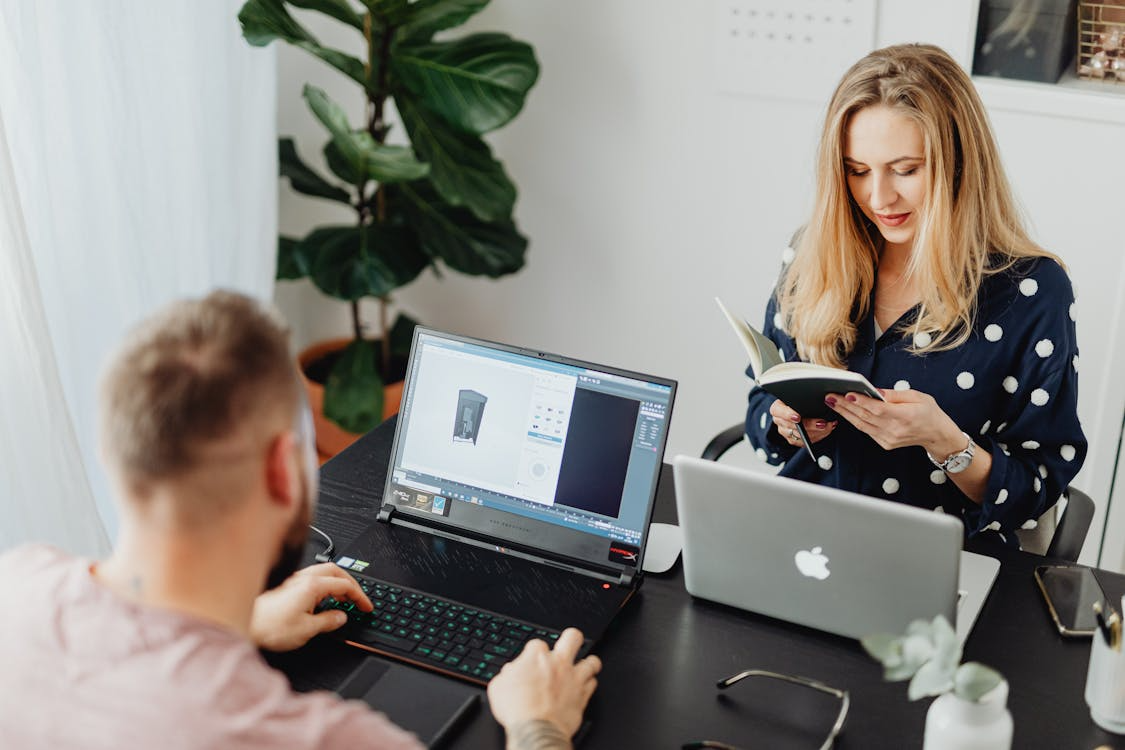 Employees using digital tools for SaaS employee time tracking