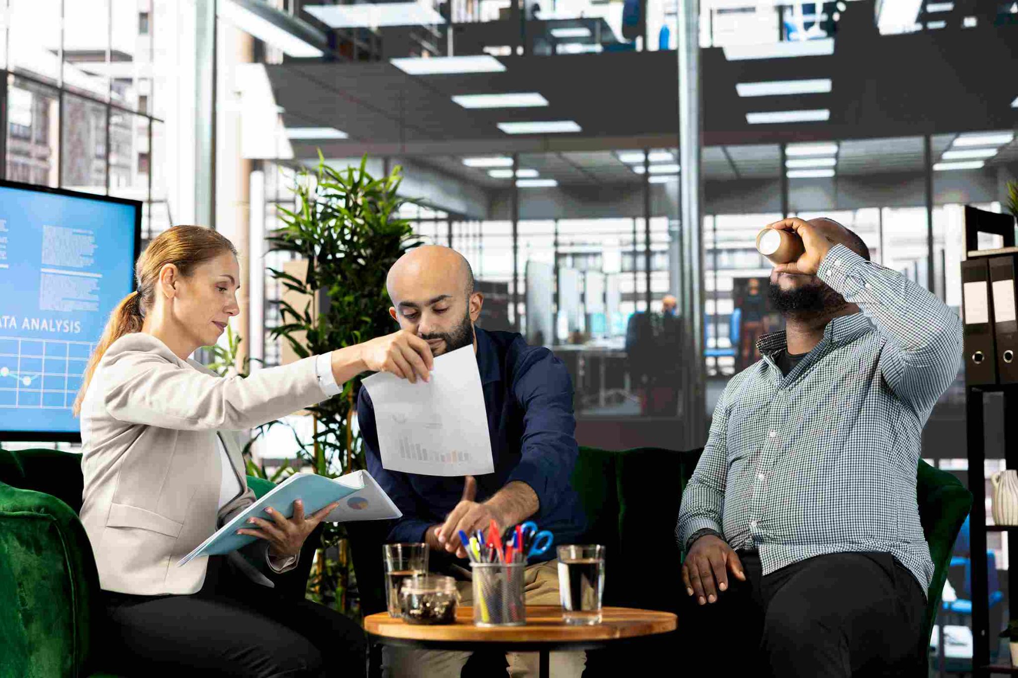 Colleagues analyzing data in an office