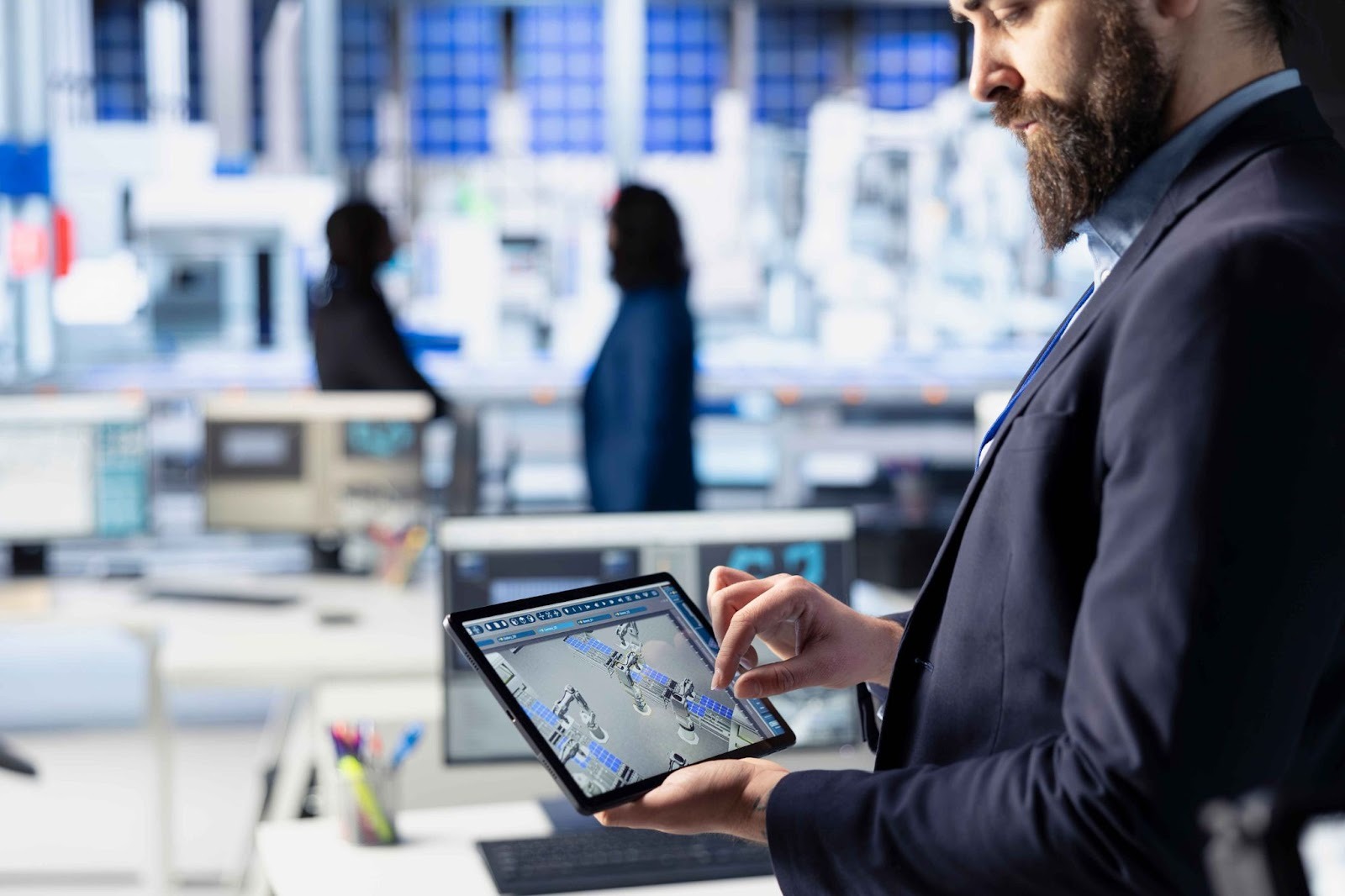 Business person holding a tablet with map interface