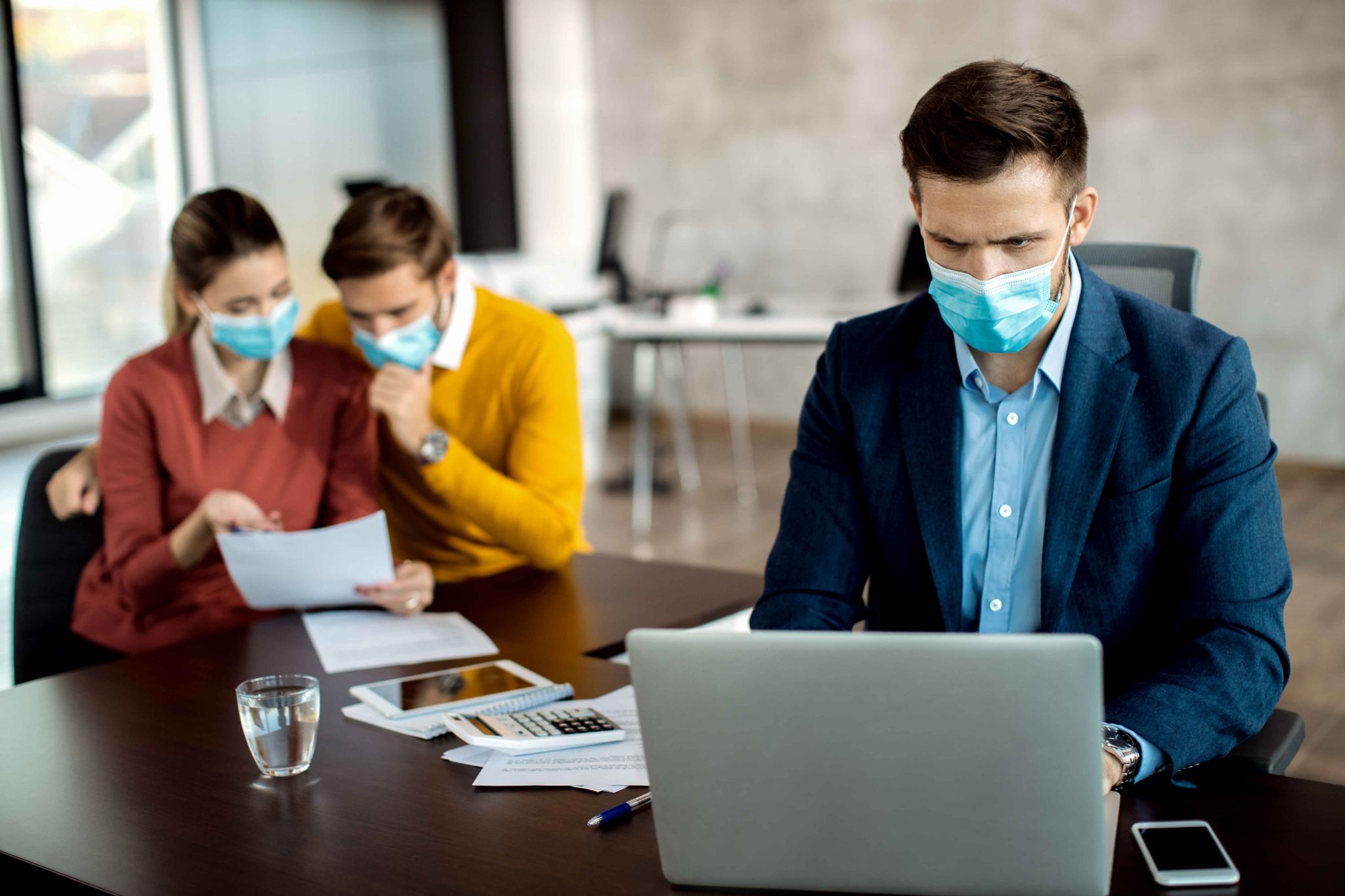 Healthcare professionals using secure time clock and compliance software