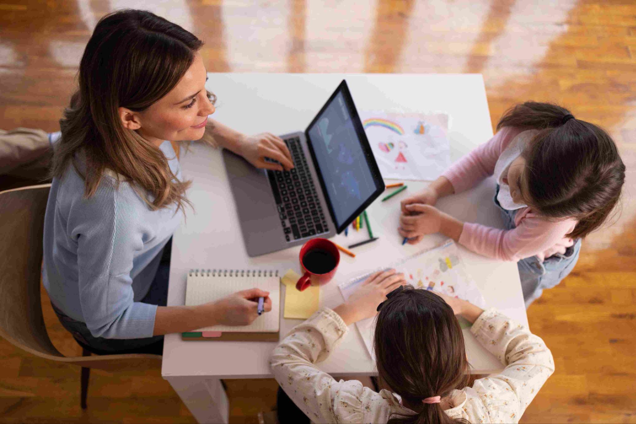 Woman and child using a laptop