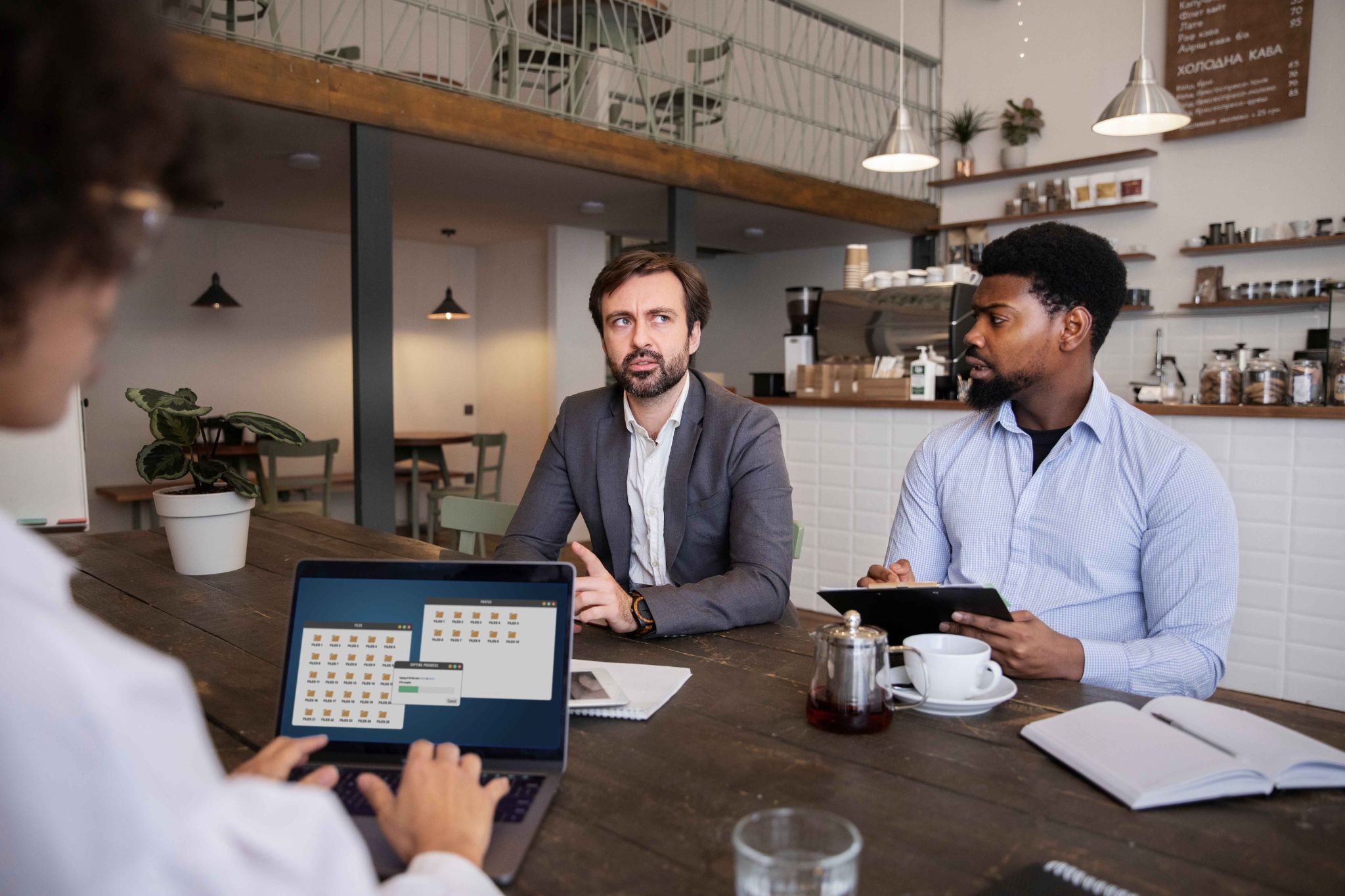 Restaurant employees discussing scheduling