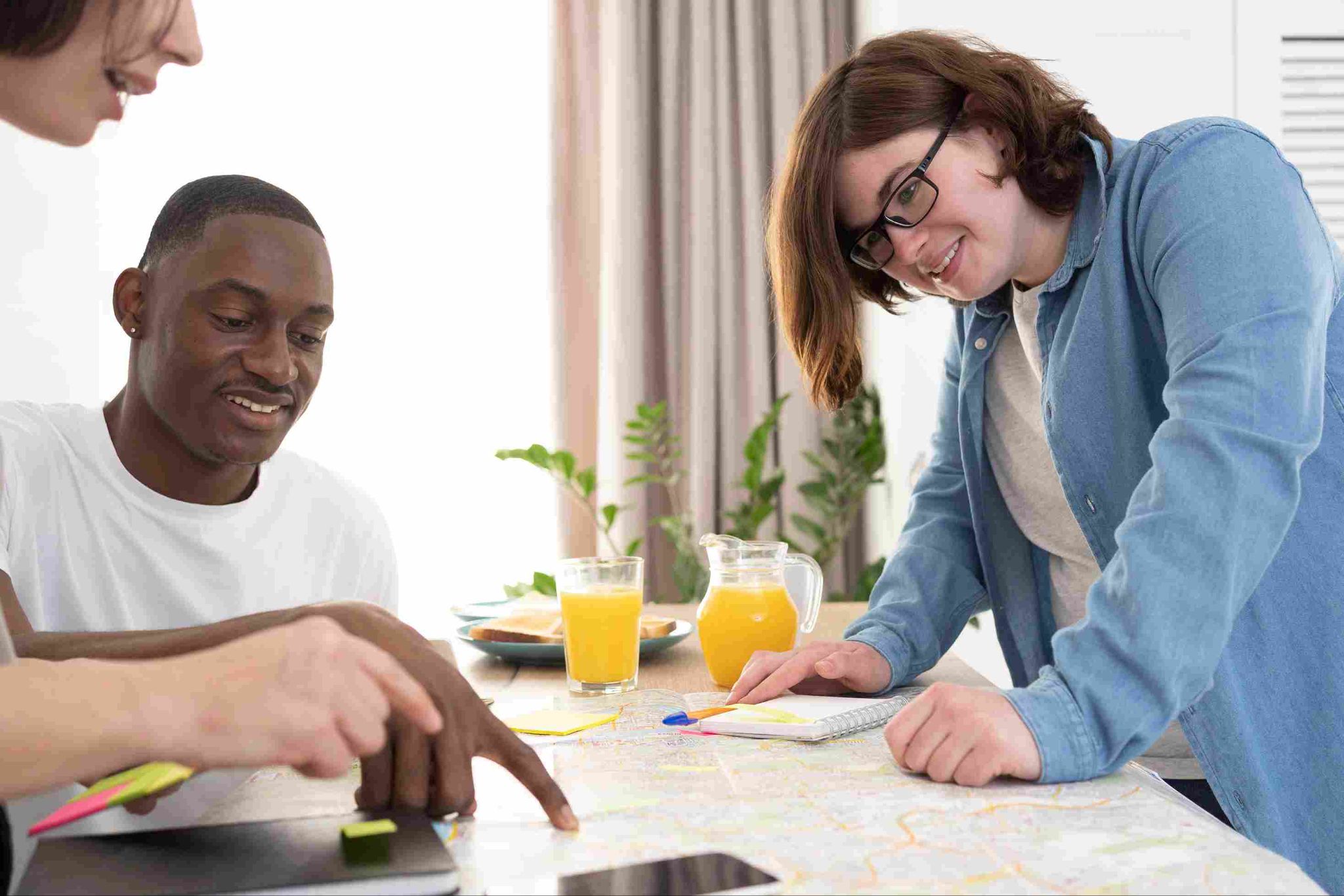 Two people reviewing documents together at a table