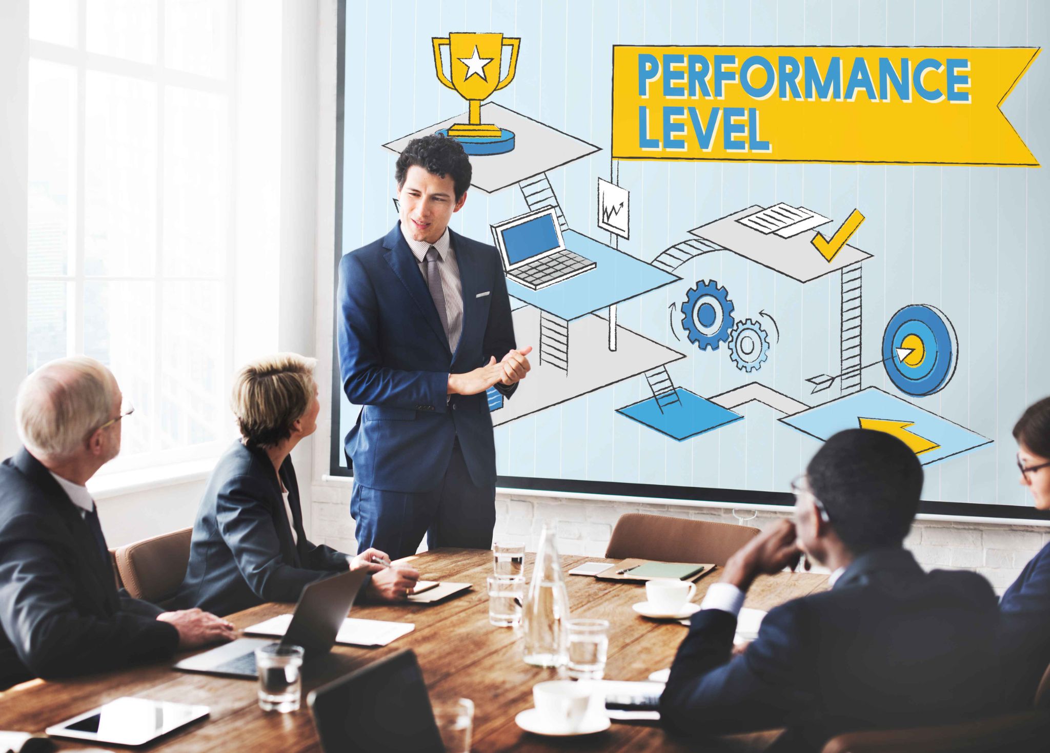 Manager presenting performance levels to the team