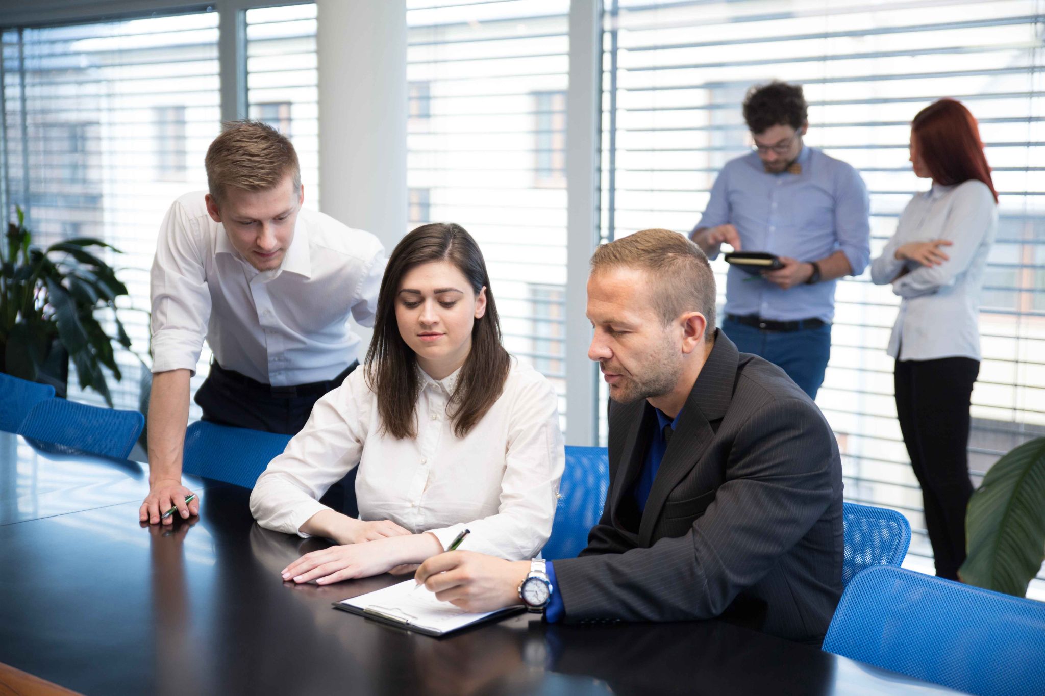 Team discussing employee attendance policy