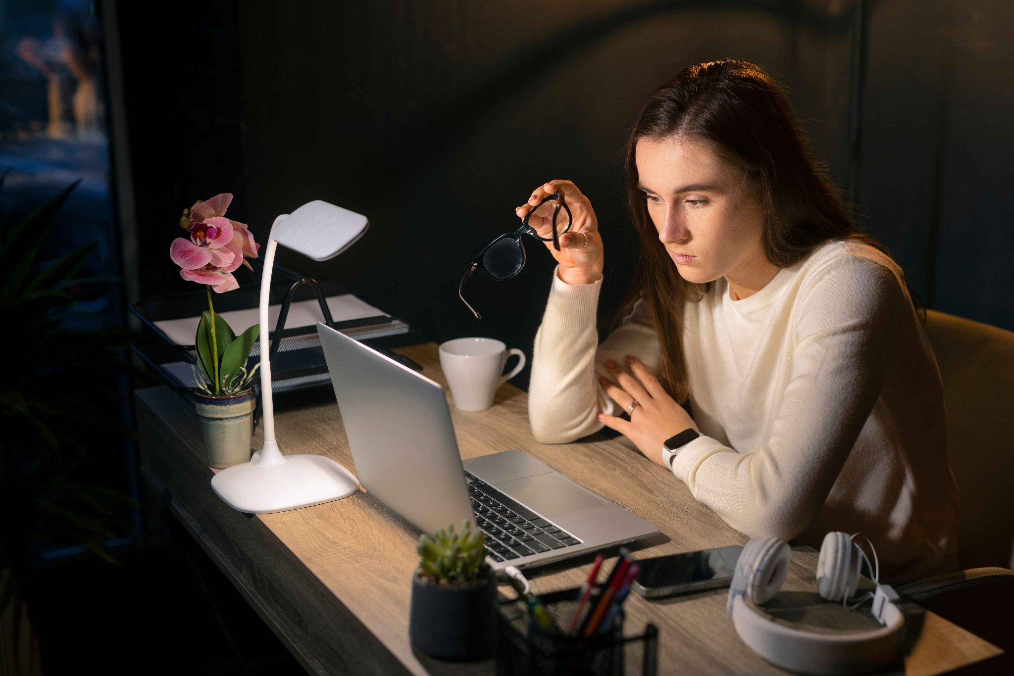 Remote worker managing time late at night