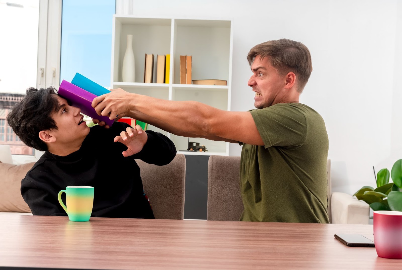 Employees fighting over a time clock