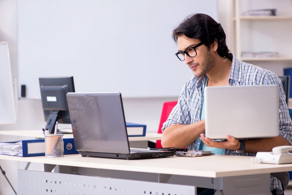 Man looking at a laptop