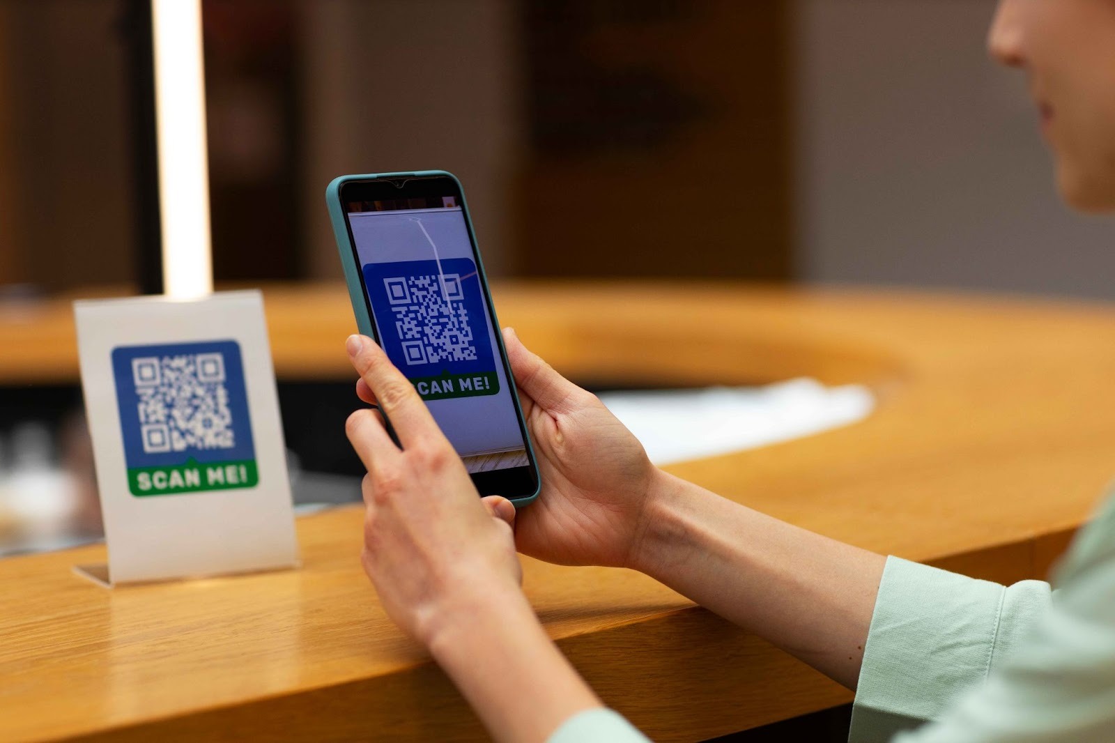 Employee scanning QR code on a smartphone