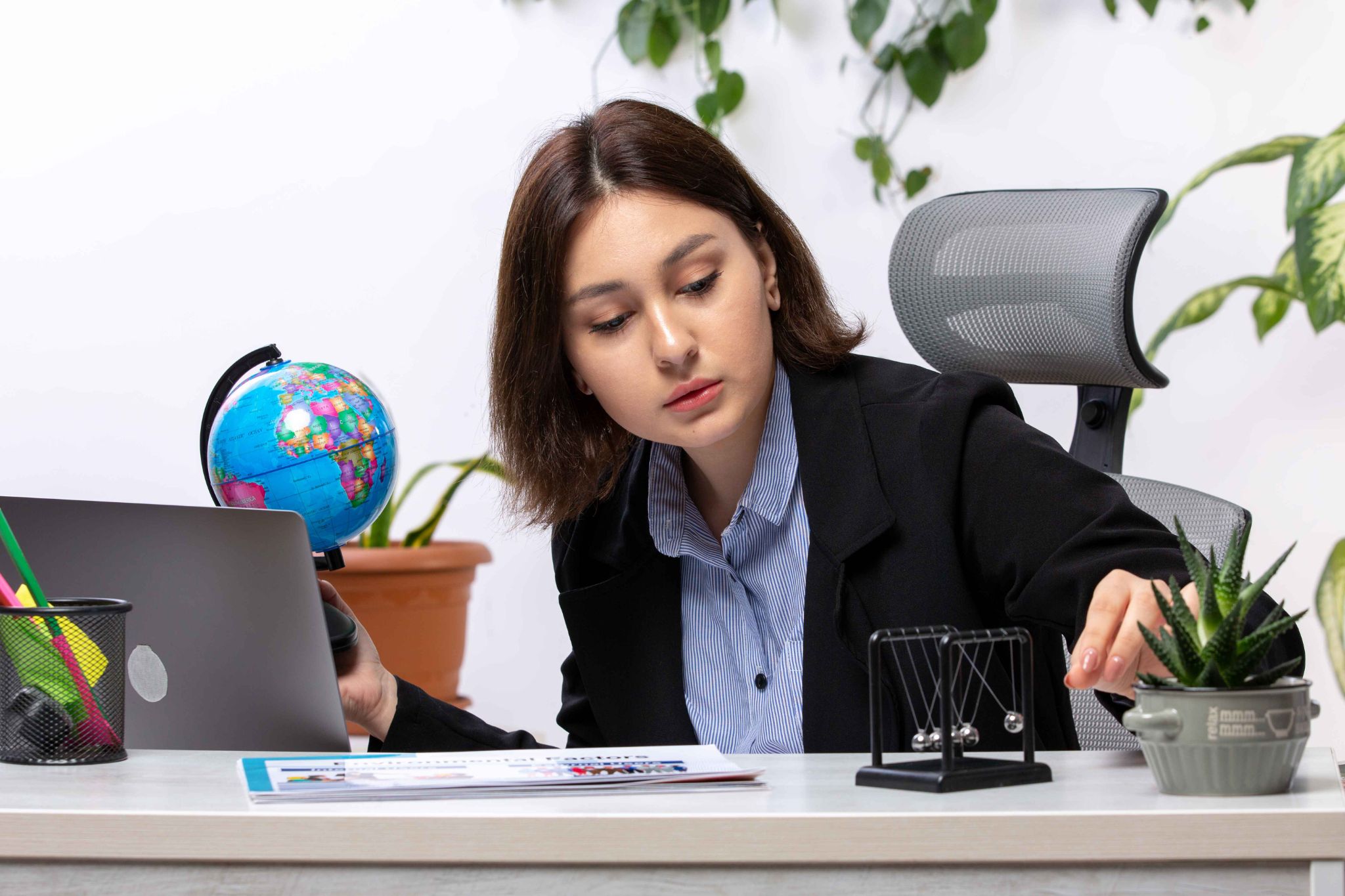 Stressed HR manager looking at laptop