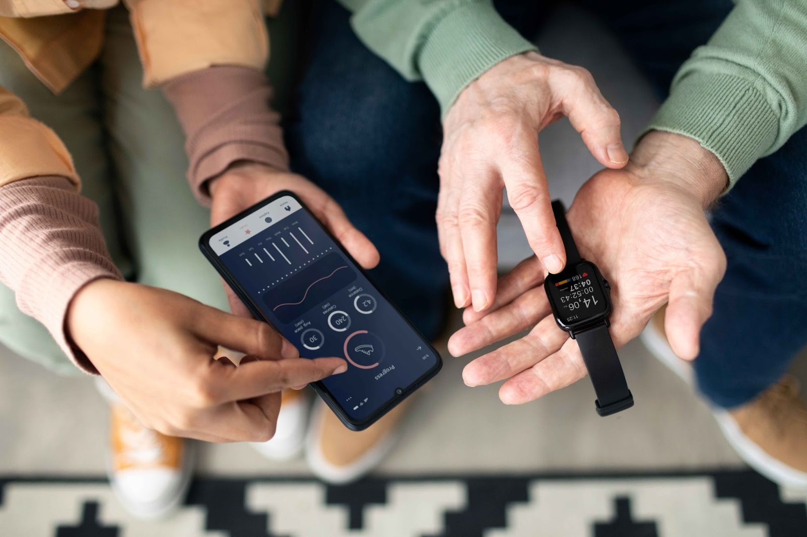 People using mobile time clock technology on smartphones and smartwatches