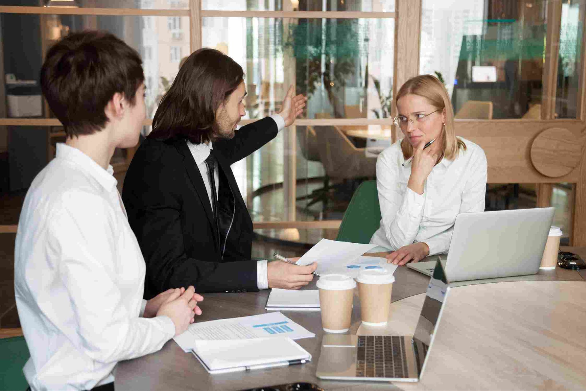 People having a discussion in a modern office