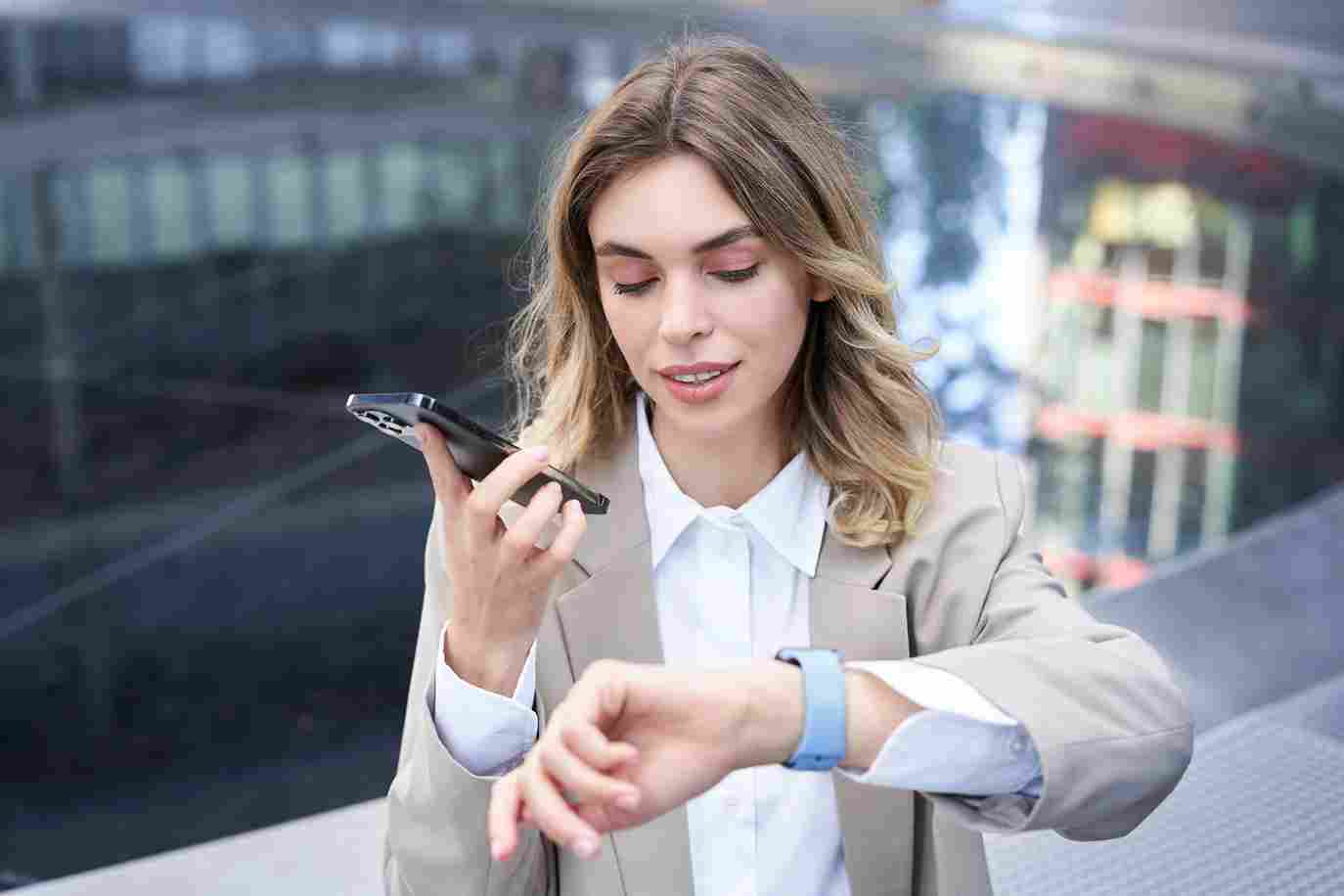 Woman looking at her smartwatch