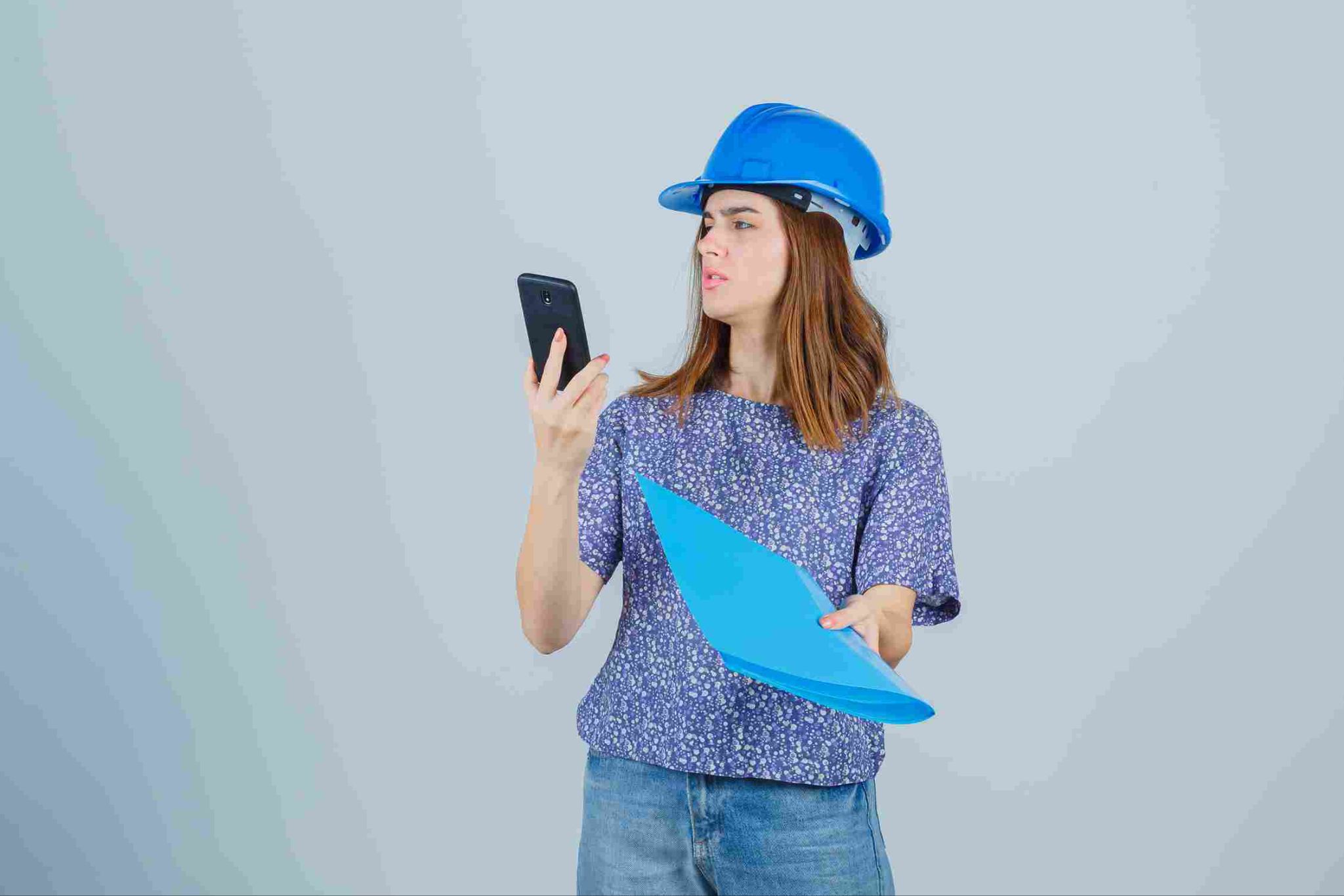 Construction worker using mobile time clock