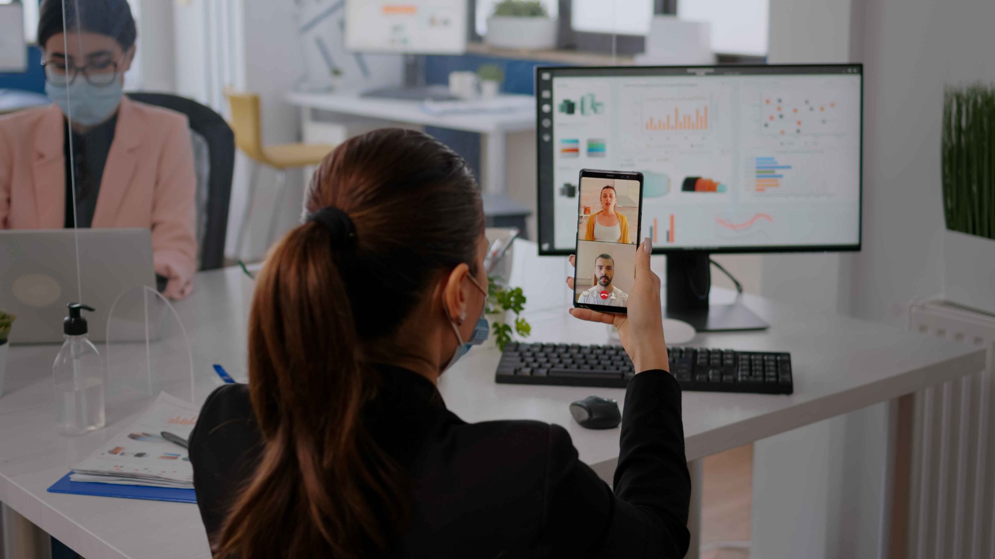 Employee using a mobile device for attendance and face recognition in an office