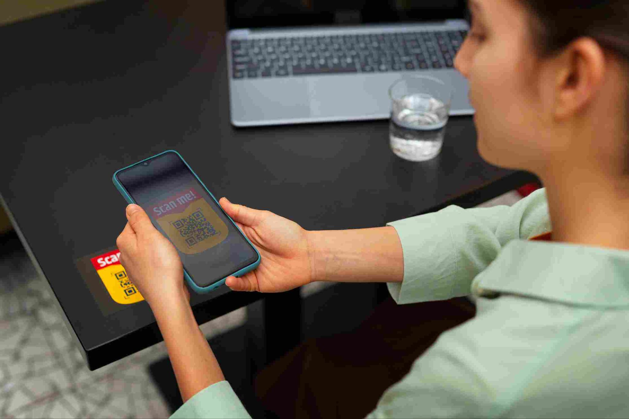 Person using a smartphone to scan for clock-in