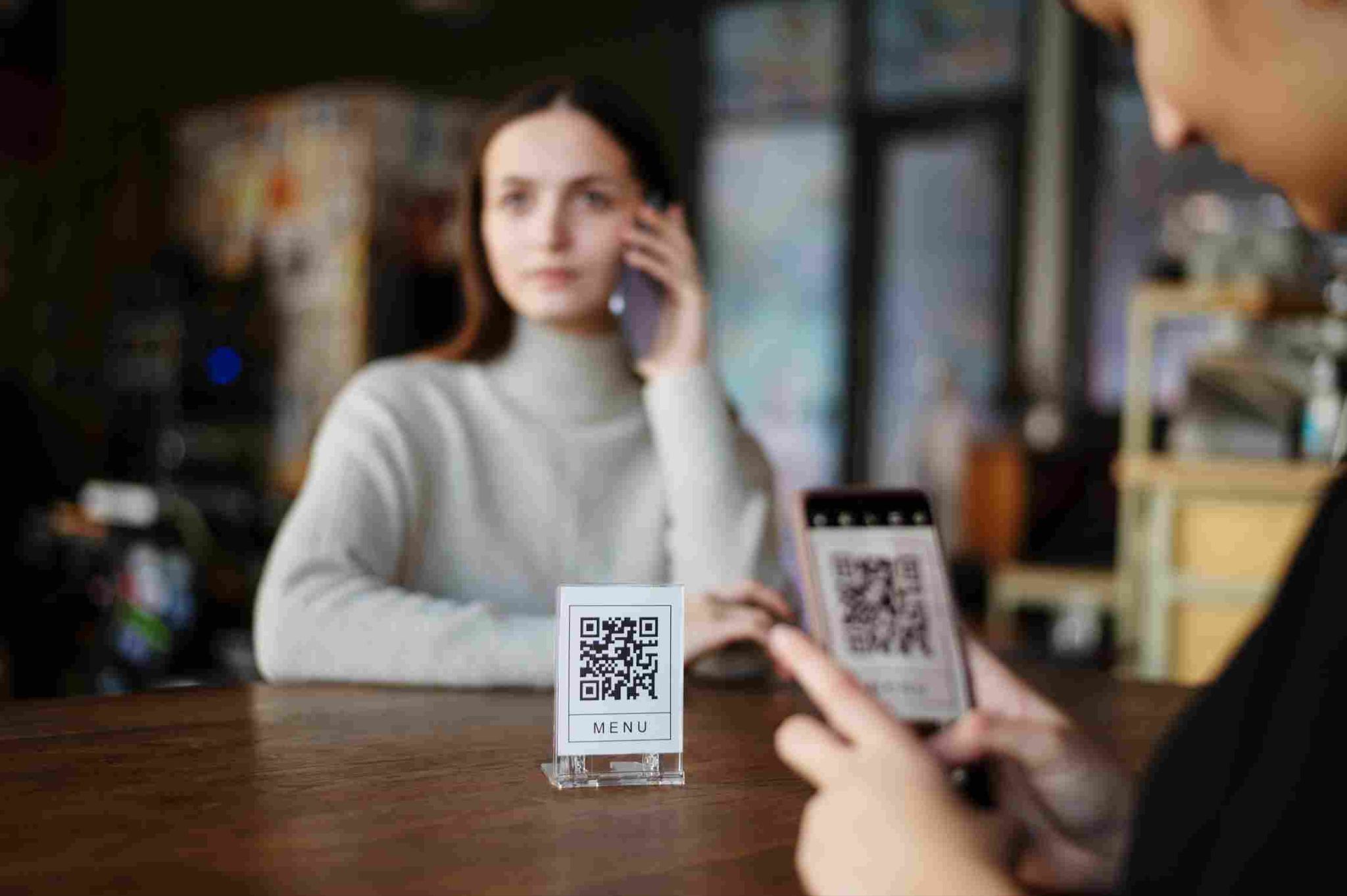 Scanning a QR code menu or standee