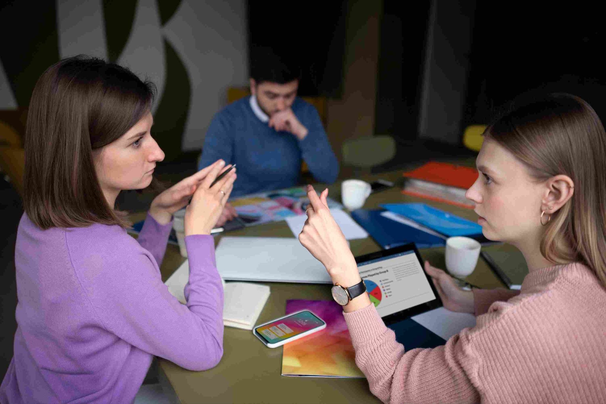 Two women talking in an office