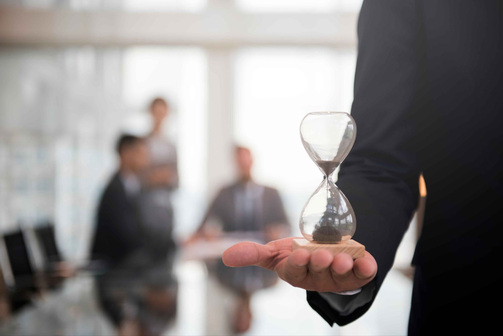 Hourglass representing efficient time management and self-service timekeeping