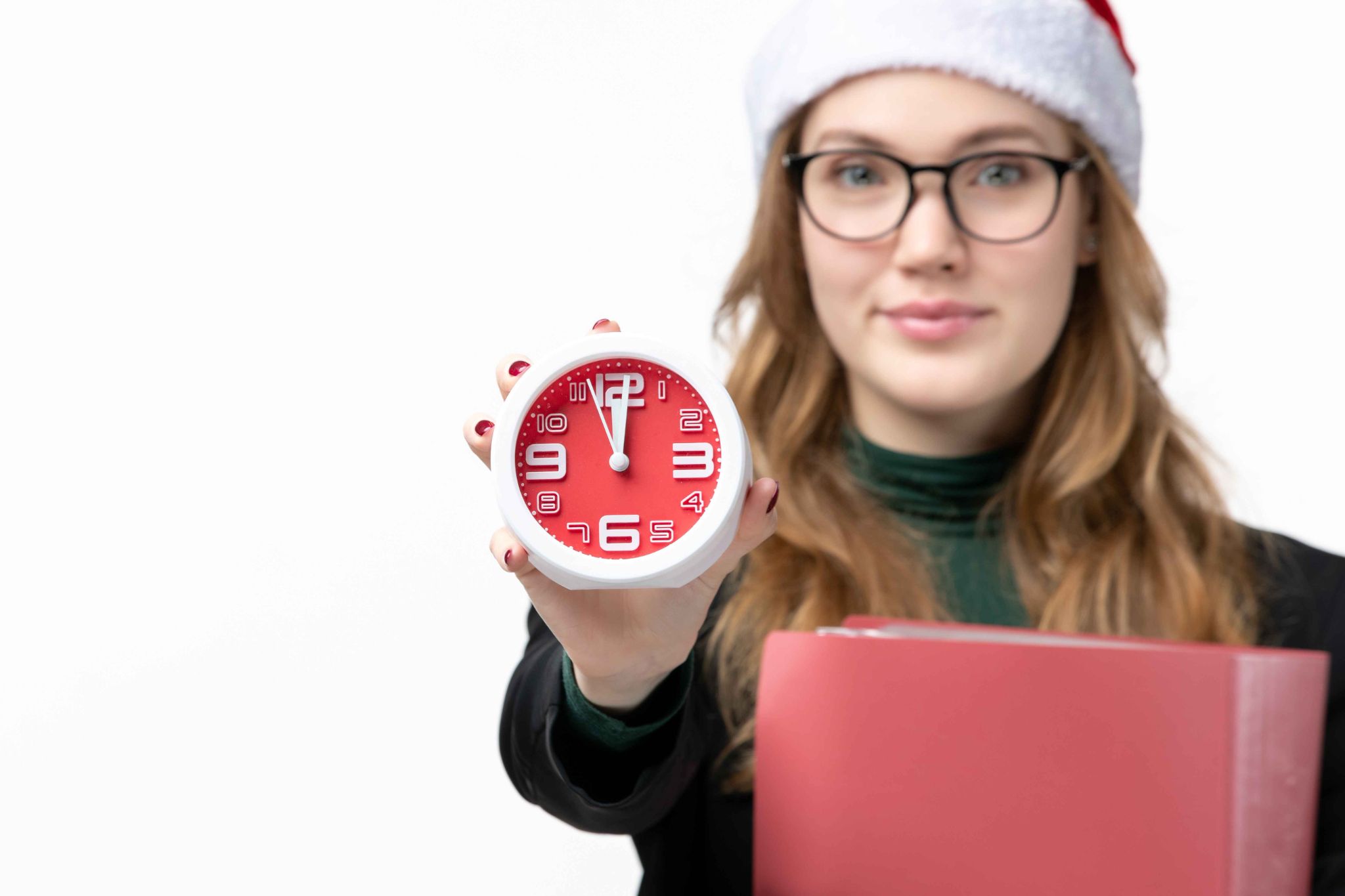 Employee holding a clock representing features of a self-service timekeeping system