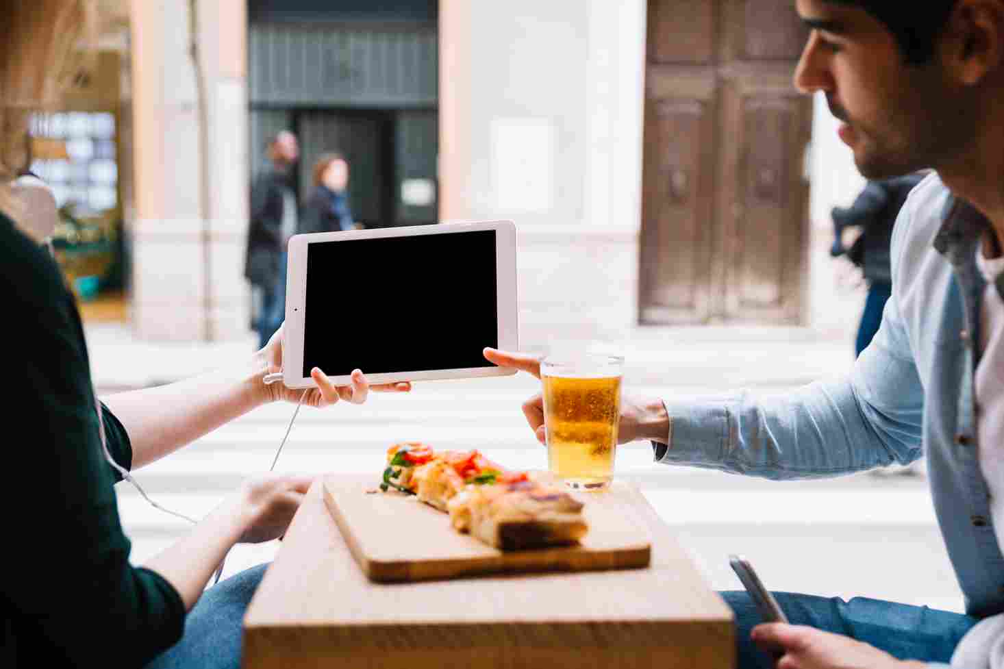 Restaurant Staff Using Tablets