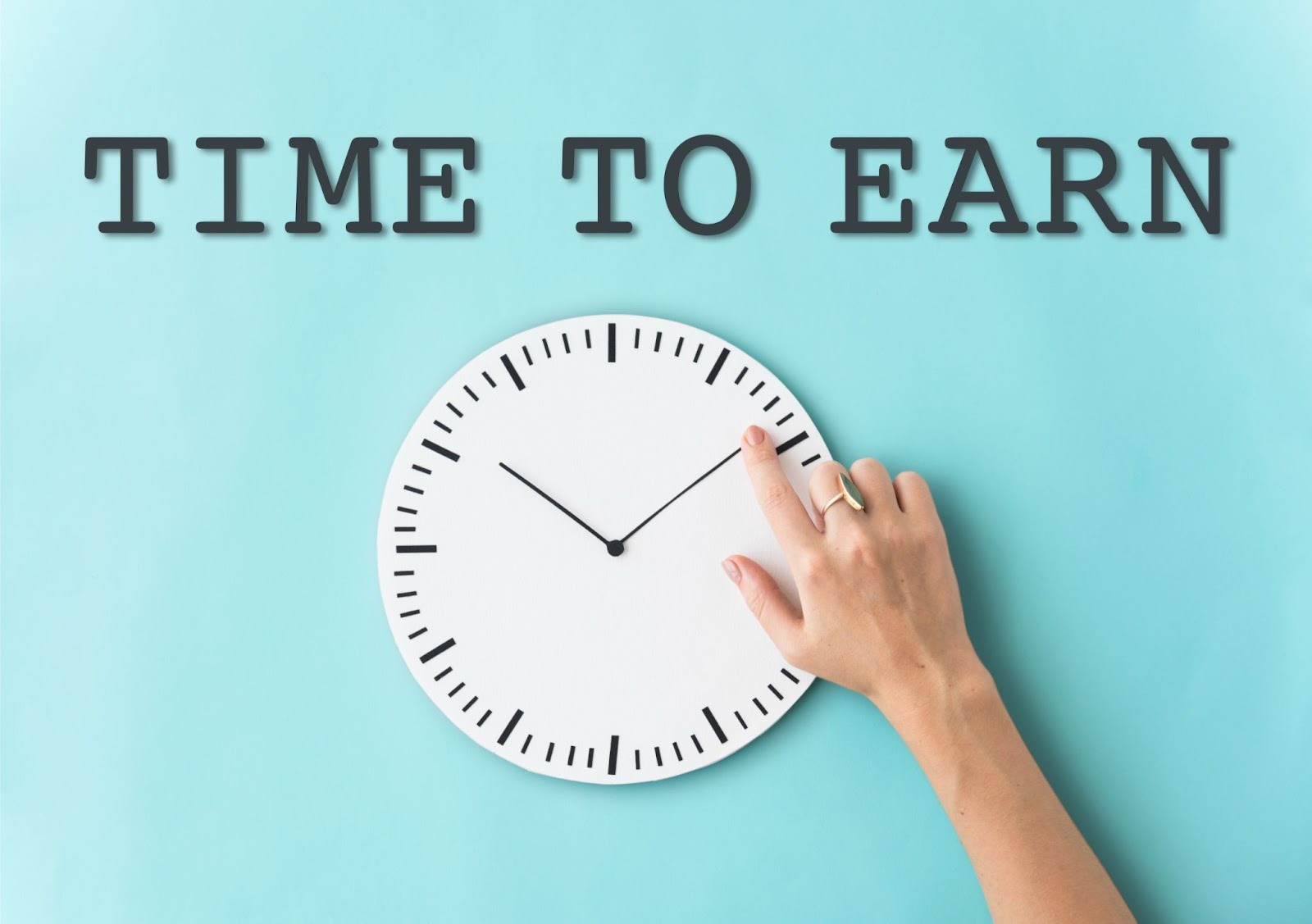 Hand touching a clock with TIME TO EARN text