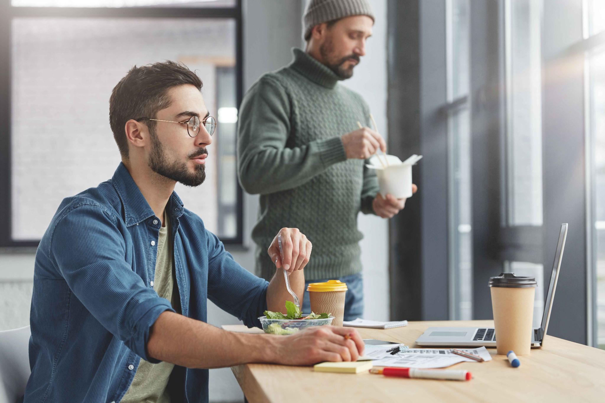 Employees taking a lunch break in the office