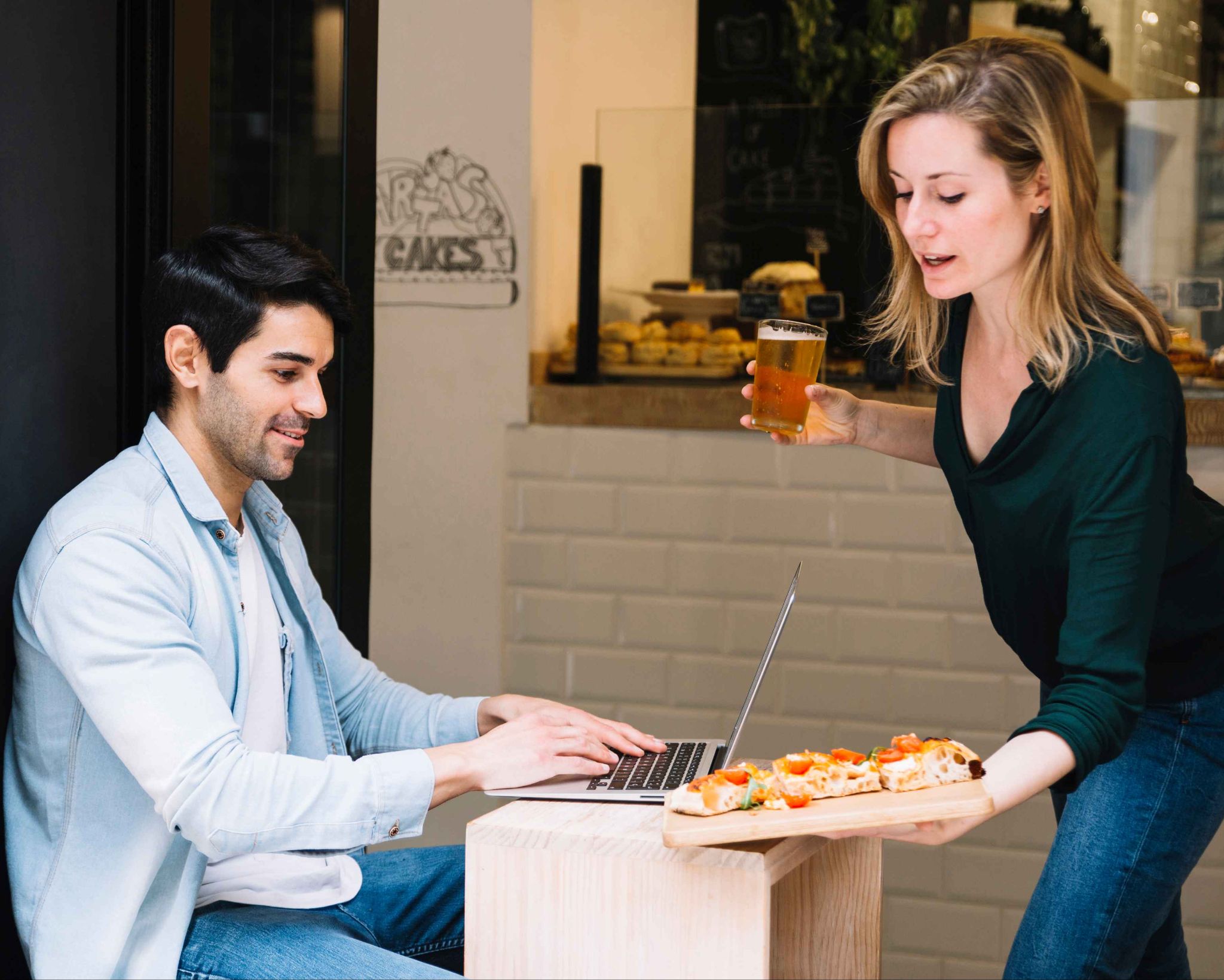 Colleagues sharing food and breaks in the office