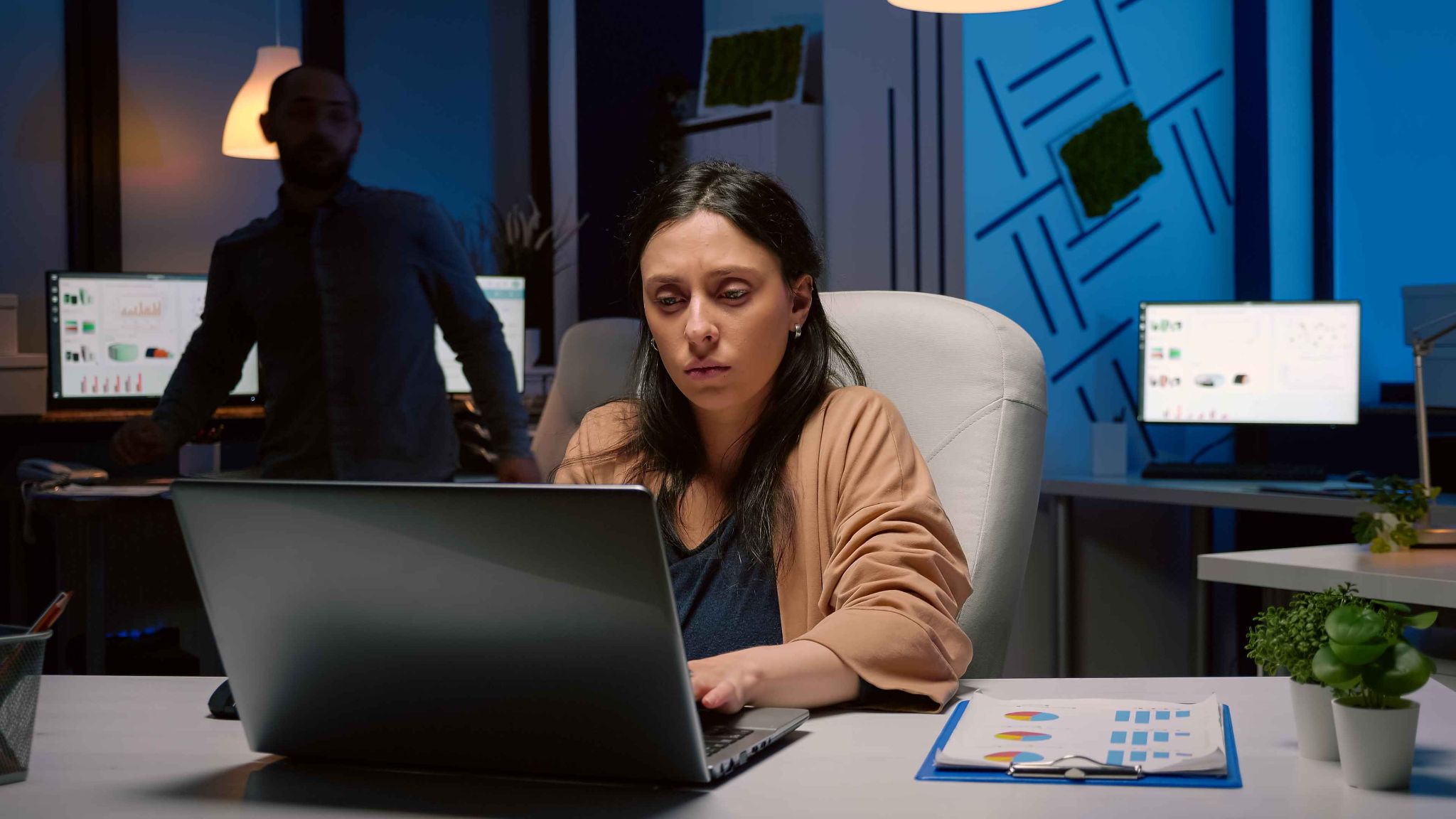 Colleagues working in office environment