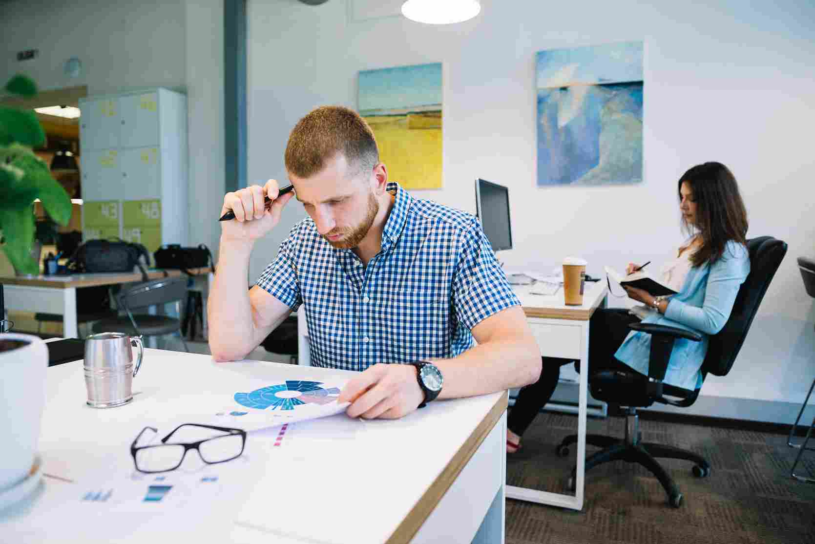 Colleagues working together in office