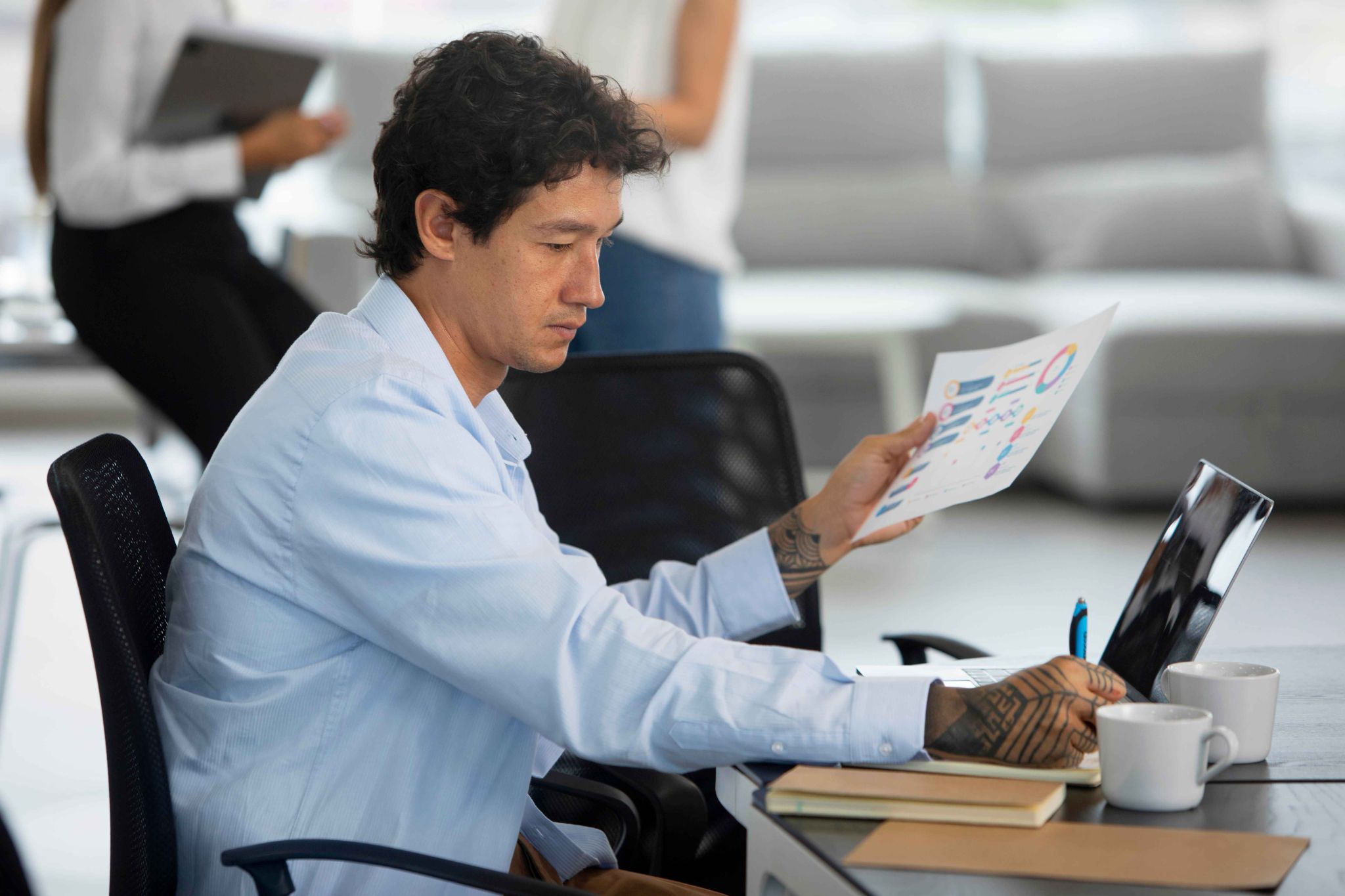 Manager reviewing payroll accuracy and timesheet data