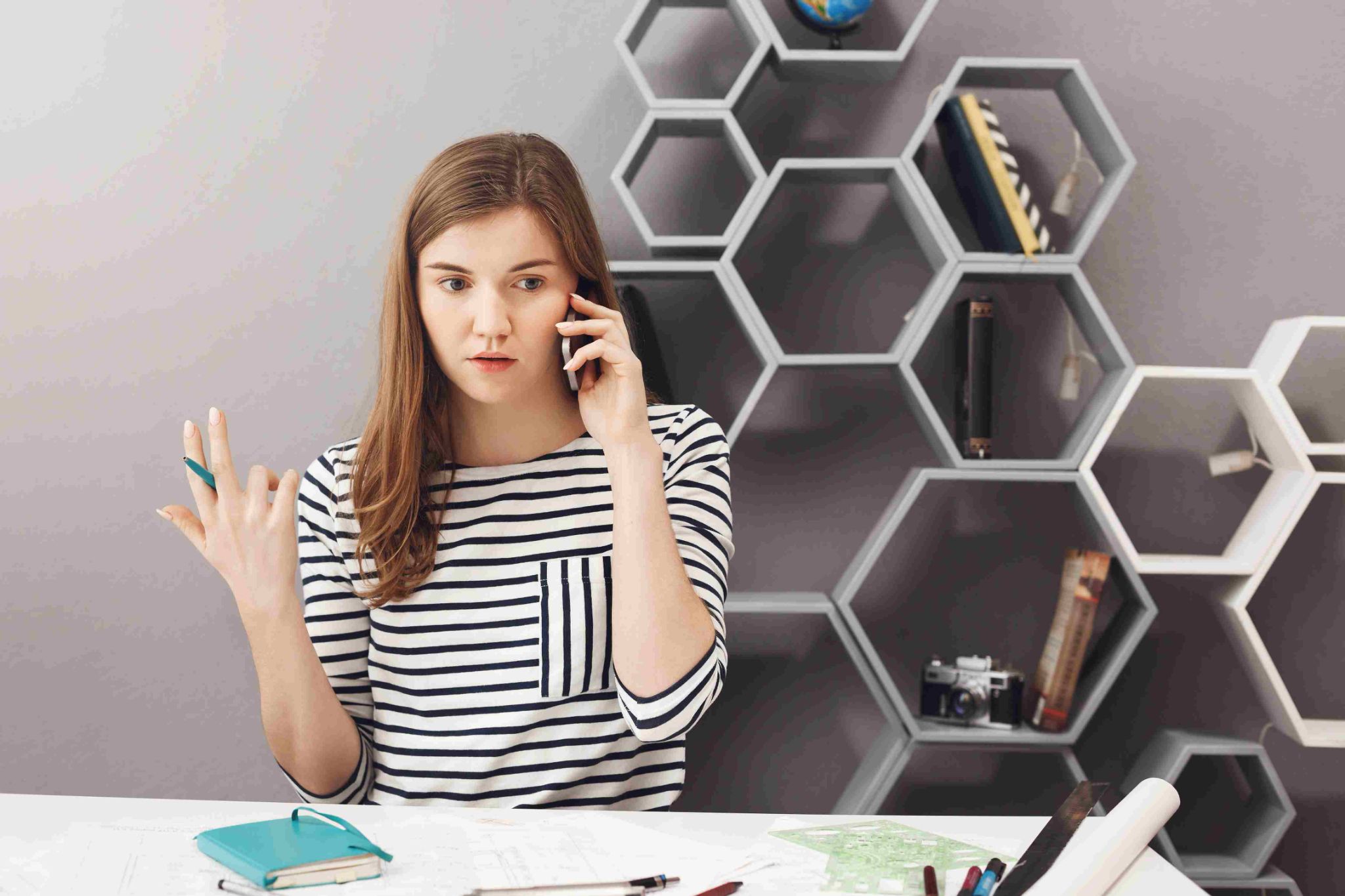Confused employee on the phone