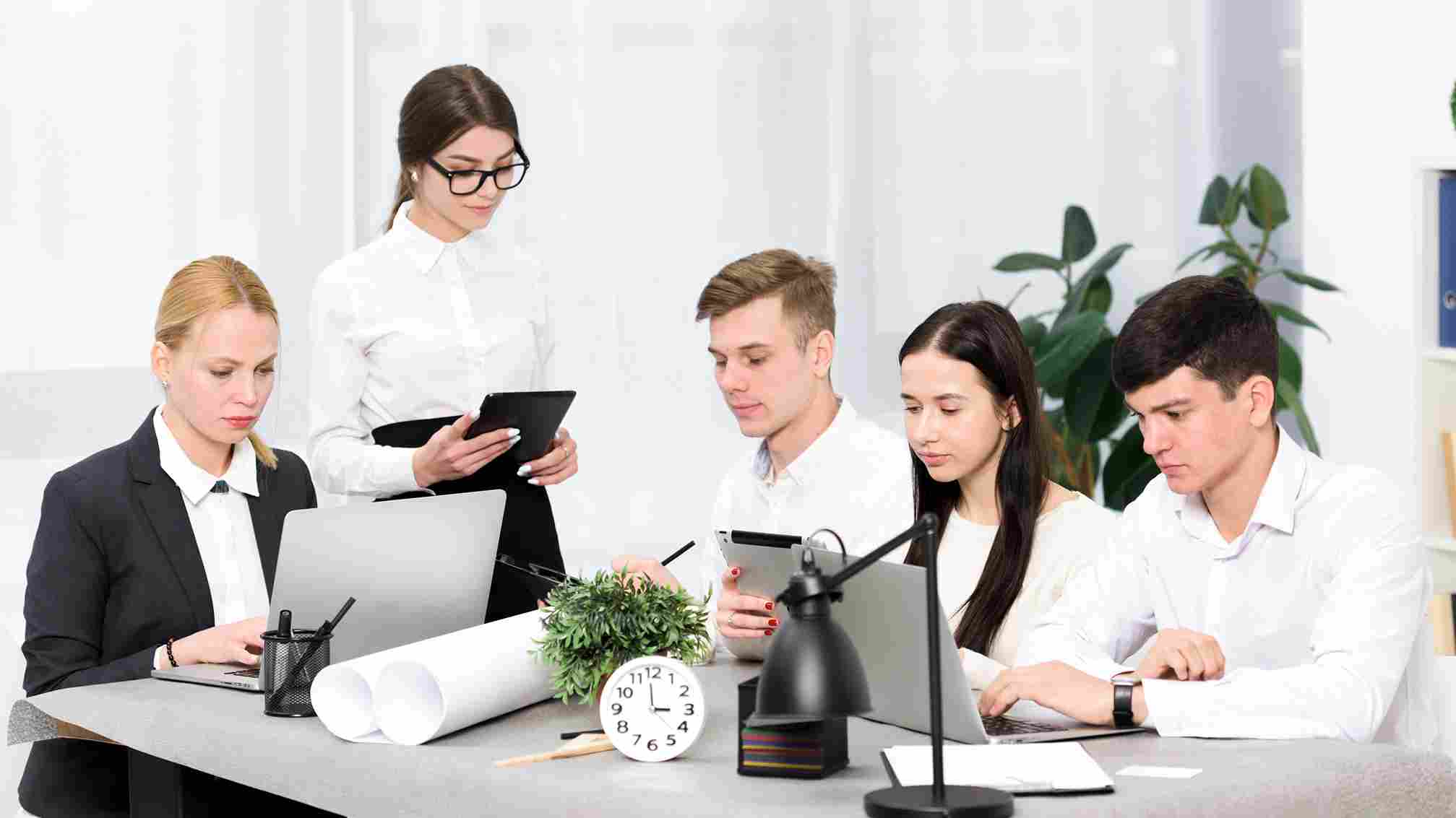 Team of employees meeting in an office